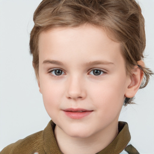 Joyful white child female with short  brown hair and grey eyes