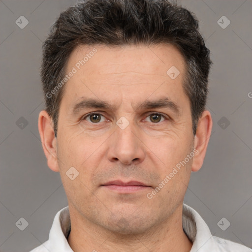 Neutral white adult male with short  brown hair and brown eyes