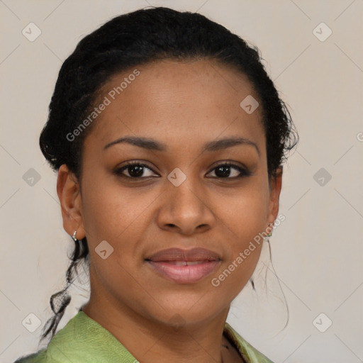 Joyful black young-adult female with short  brown hair and brown eyes