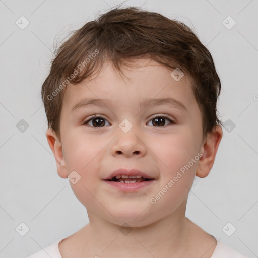 Joyful white child male with short  brown hair and brown eyes