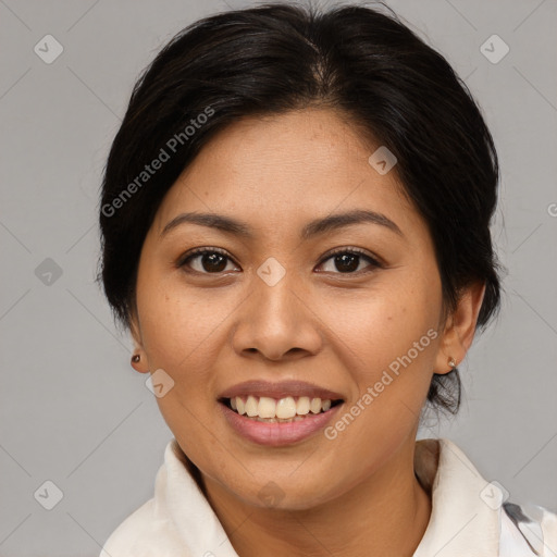 Joyful asian young-adult female with medium  brown hair and brown eyes