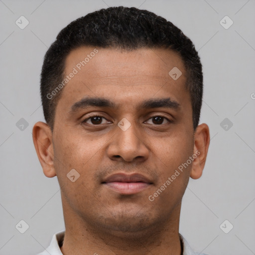 Neutral latino young-adult male with short  black hair and brown eyes
