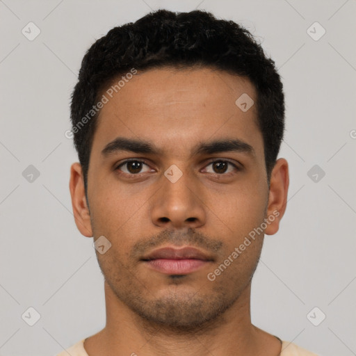 Neutral latino young-adult male with short  black hair and brown eyes