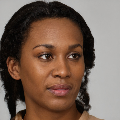 Neutral black young-adult female with short  brown hair and brown eyes