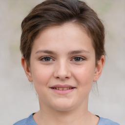 Joyful white child female with short  brown hair and brown eyes