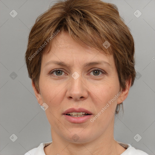 Joyful white adult female with short  brown hair and brown eyes