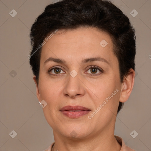 Joyful white adult female with short  brown hair and brown eyes