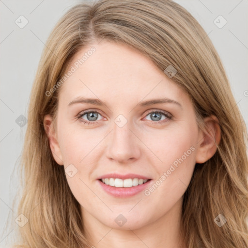 Joyful white young-adult female with long  brown hair and blue eyes