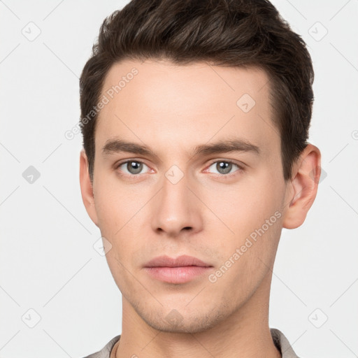 Neutral white young-adult male with short  brown hair and brown eyes