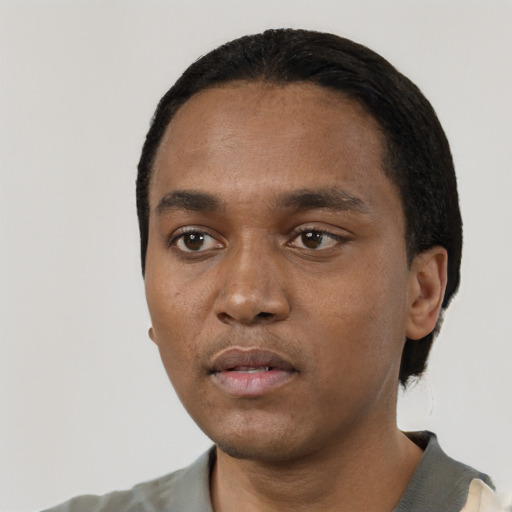 Neutral black young-adult male with short  black hair and brown eyes