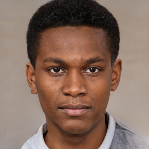 Neutral black young-adult male with short  brown hair and brown eyes