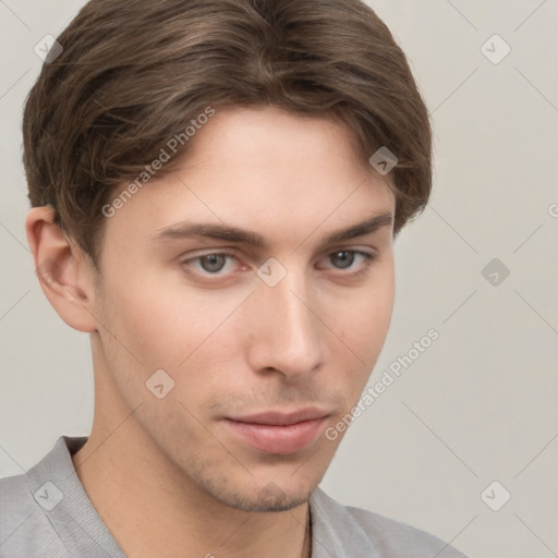 Neutral white young-adult male with short  brown hair and grey eyes