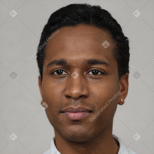 Neutral black young-adult male with short  black hair and brown eyes