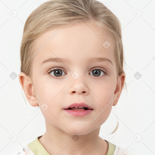 Joyful white child female with medium  brown hair and brown eyes