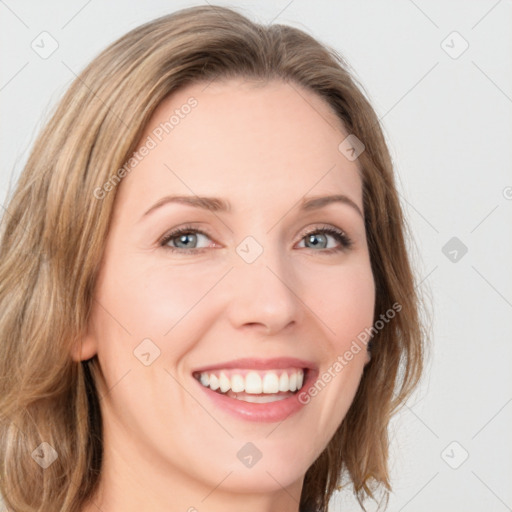 Joyful white young-adult female with medium  brown hair and green eyes