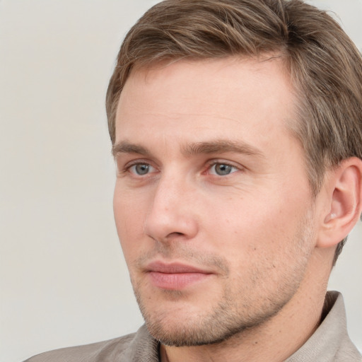 Neutral white young-adult male with short  brown hair and grey eyes