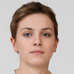 Neutral white young-adult female with short  brown hair and grey eyes