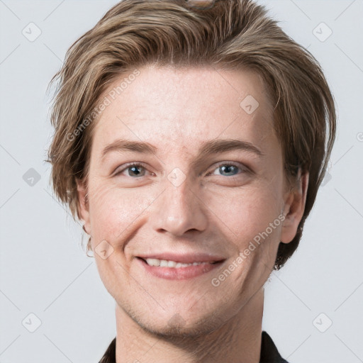 Joyful white adult male with short  brown hair and grey eyes