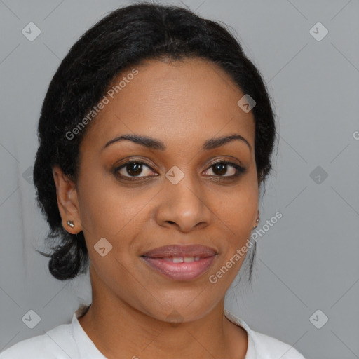 Joyful black young-adult female with medium  brown hair and brown eyes