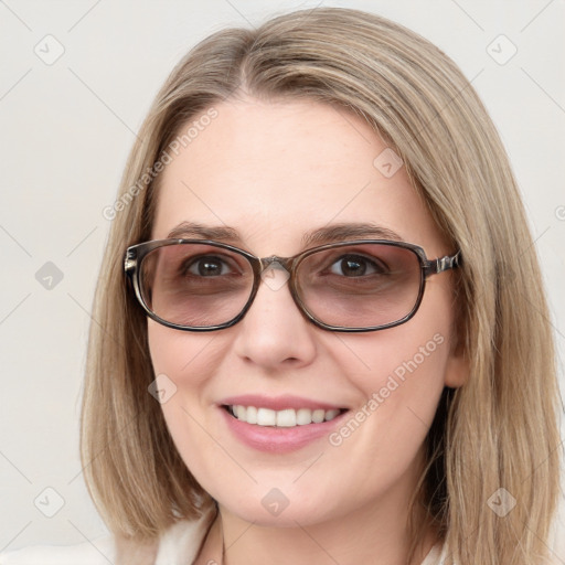 Joyful white young-adult female with medium  brown hair and blue eyes