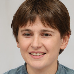 Joyful white young-adult male with medium  brown hair and brown eyes