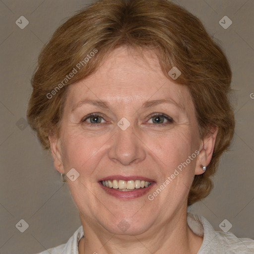 Joyful white adult female with medium  brown hair and blue eyes