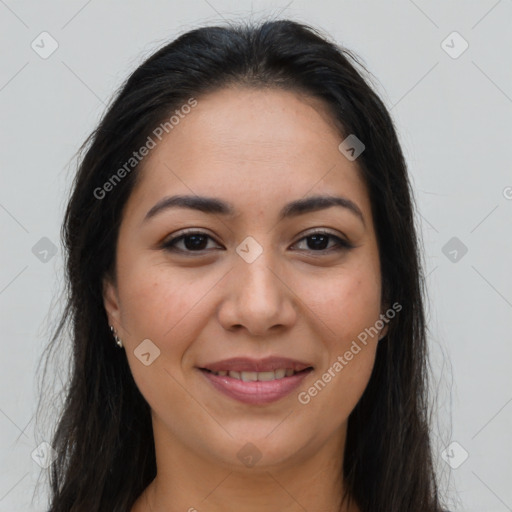 Joyful latino young-adult female with long  brown hair and brown eyes