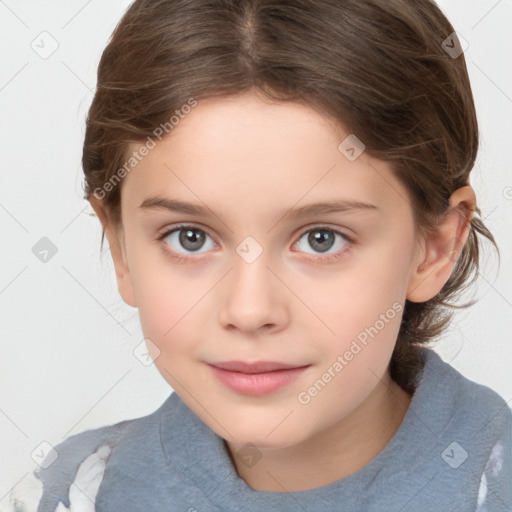 Joyful white child female with medium  brown hair and grey eyes