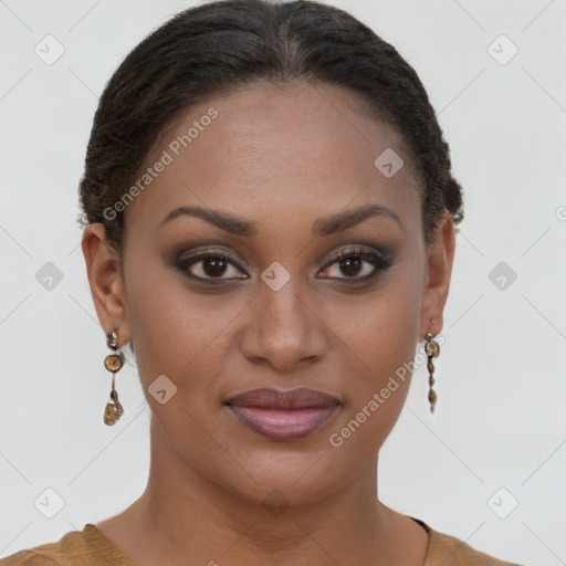 Joyful black young-adult female with short  brown hair and brown eyes