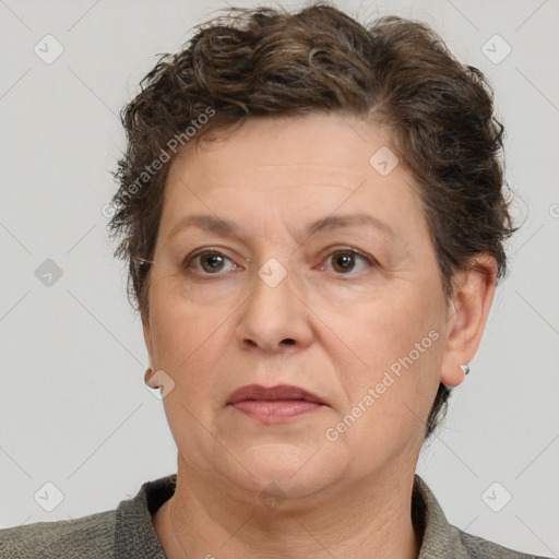 Joyful white adult female with short  brown hair and brown eyes