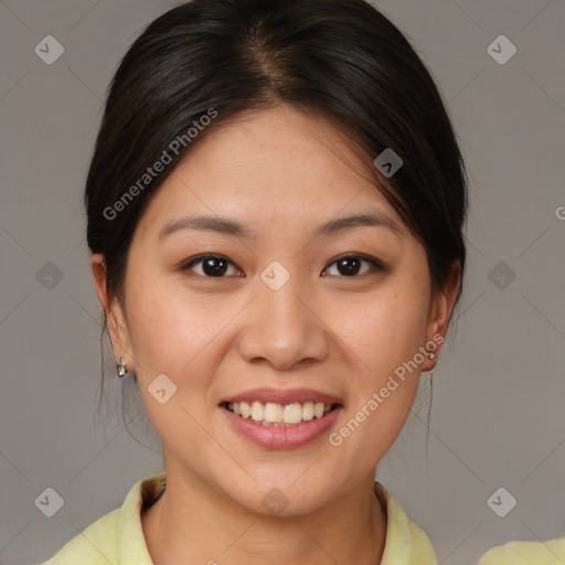 Joyful asian young-adult female with medium  brown hair and brown eyes