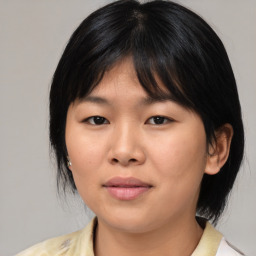 Neutral asian young-adult female with medium  black hair and brown eyes