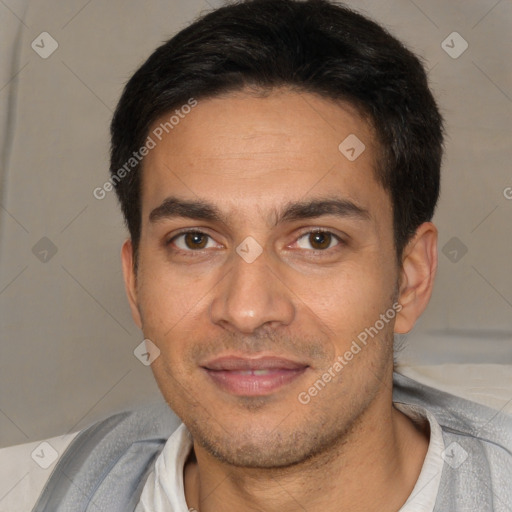 Joyful white young-adult male with short  black hair and brown eyes