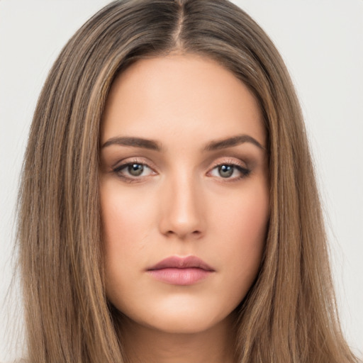 Neutral white young-adult female with long  brown hair and brown eyes