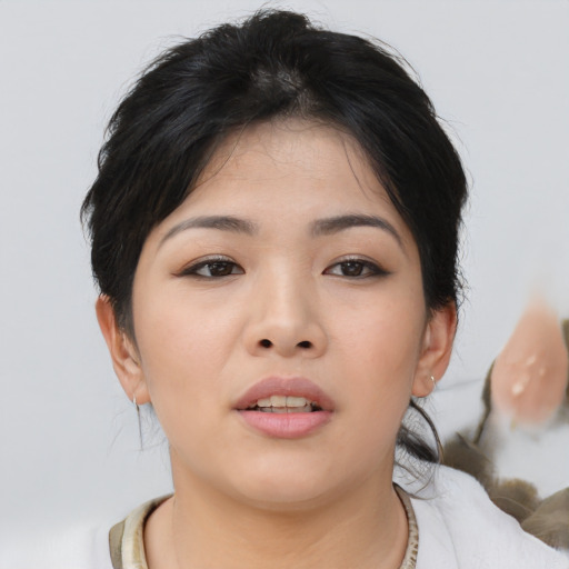 Neutral asian young-adult female with medium  brown hair and brown eyes