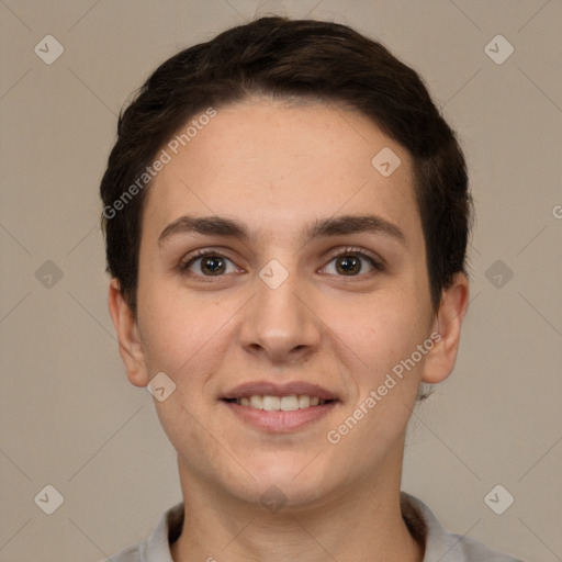 Joyful white young-adult female with short  brown hair and brown eyes