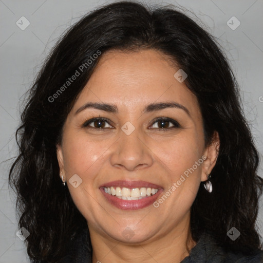 Joyful white adult female with long  brown hair and brown eyes