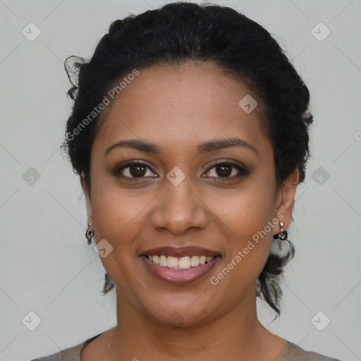 Joyful black young-adult female with medium  black hair and brown eyes