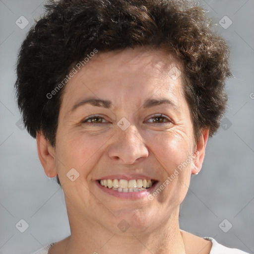 Joyful white adult female with short  brown hair and brown eyes