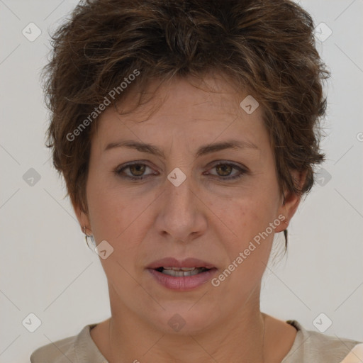 Joyful white adult female with short  brown hair and brown eyes