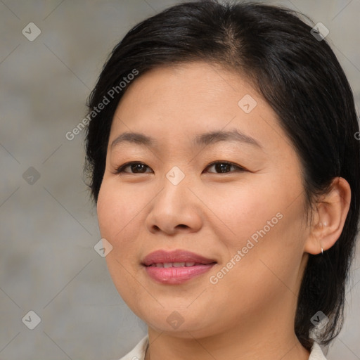 Joyful asian young-adult female with medium  brown hair and brown eyes