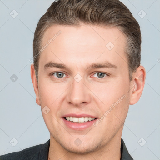 Joyful white young-adult male with short  brown hair and brown eyes