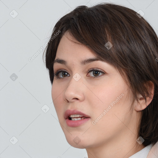 Neutral white young-adult female with medium  brown hair and brown eyes