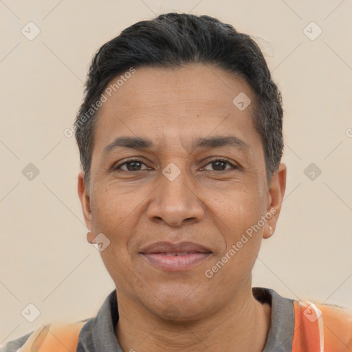 Joyful latino adult male with short  black hair and brown eyes