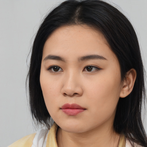 Neutral asian young-adult female with long  black hair and brown eyes