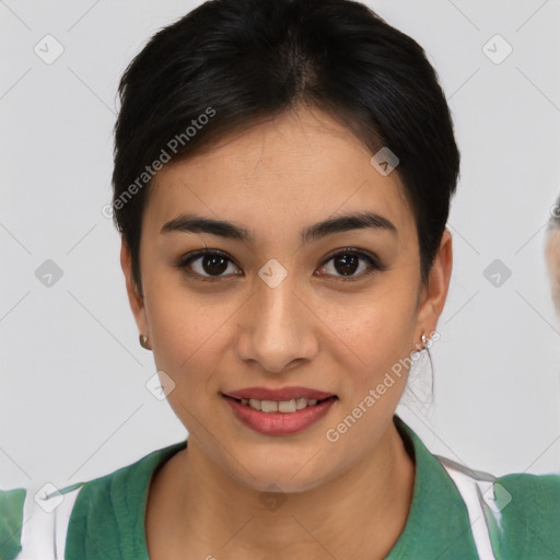 Joyful asian young-adult female with short  brown hair and brown eyes