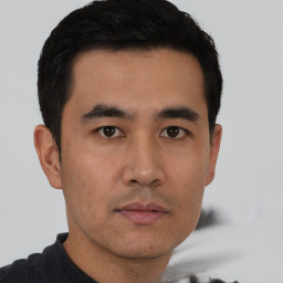 Neutral asian young-adult male with short  black hair and brown eyes