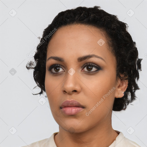 Neutral latino young-adult female with short  black hair and brown eyes