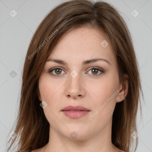 Neutral white young-adult female with long  brown hair and brown eyes