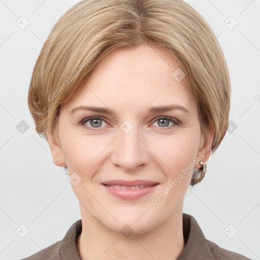 Joyful white young-adult female with short  brown hair and grey eyes